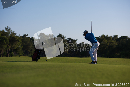 Image of golfer hitting long shot