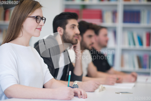 Image of group of students study together in classroom