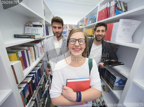 Image of students group  in school  library