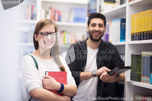 Image of students group  in school  library