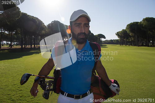 Image of golf player walking