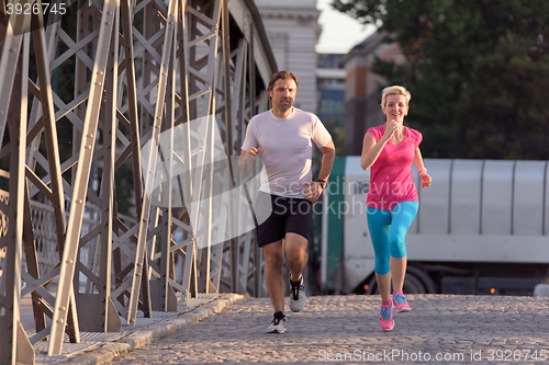 Image of couple jogging