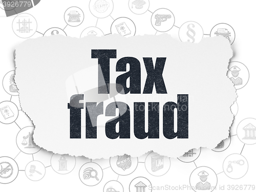 Image of Law concept: Tax Fraud on Torn Paper background