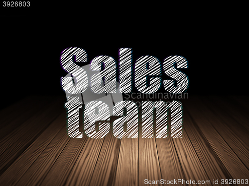 Image of Advertising concept: Sales Team in grunge dark room