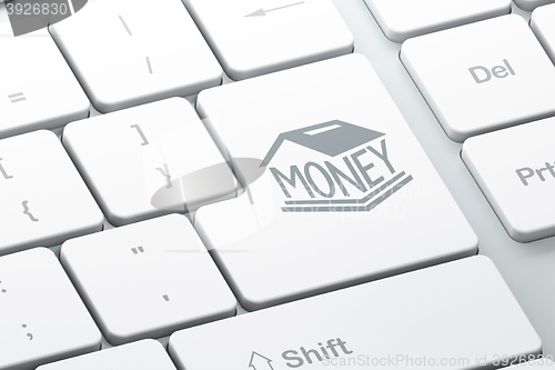 Image of Money concept: Money Box on computer keyboard background