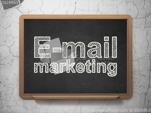 Image of Advertising concept: E-mail Marketing on chalkboard background