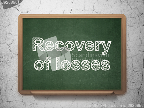 Image of Currency concept: Recovery Of losses on chalkboard background
