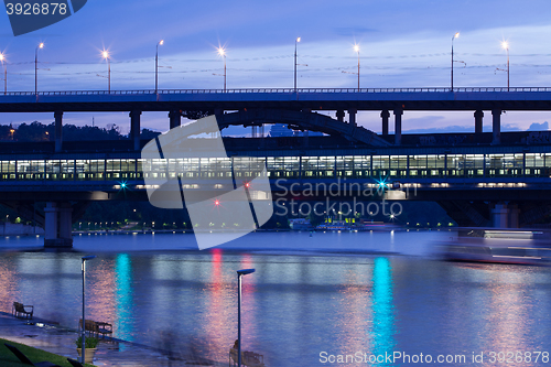 Image of summer night landscape with Luzhnetsky metro bridge