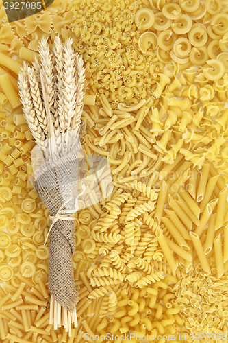 Image of Dried Pasta and Wheat Background