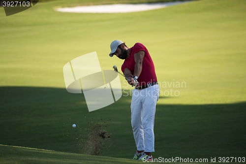 Image of golf player hitting long shot