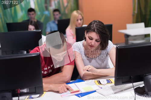 Image of technology students group working  in computer lab school  class