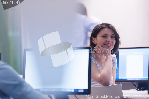 Image of technology students group in computer lab school  classroom