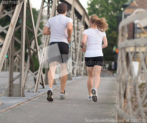 Image of couple jogging
