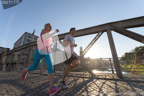 Image of couple jogging