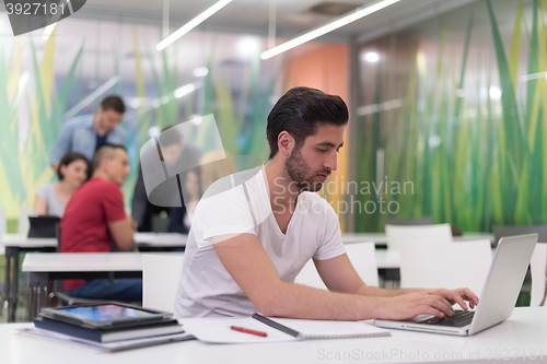 Image of male student in classroom