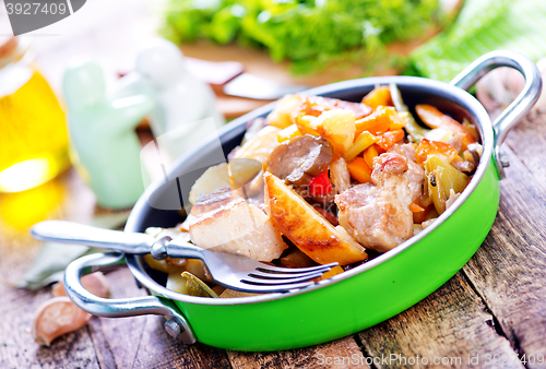 Image of fried meat with vegetables