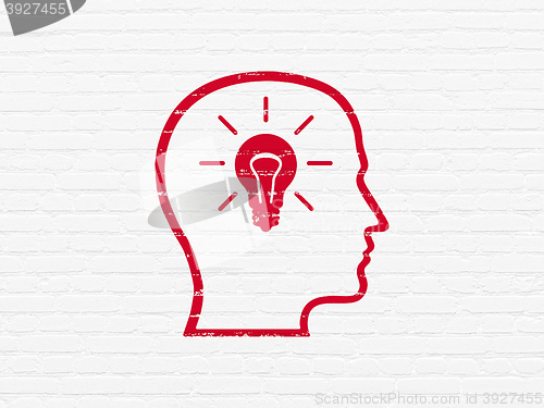 Image of Information concept: Head With Lightbulb on wall background