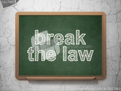Image of Law concept: Break The Law on chalkboard background