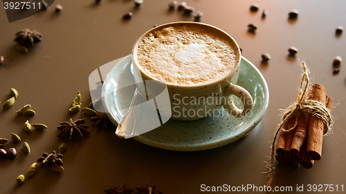 Image of Cup of hot latte coffee on table