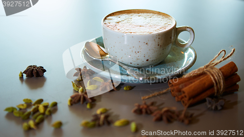 Image of Cup of hot latte coffee on table