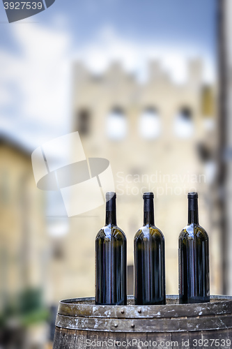 Image of Winte bottles on a barrel