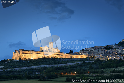 Image of Illuminated cityscape Assisi basilica and monastery 