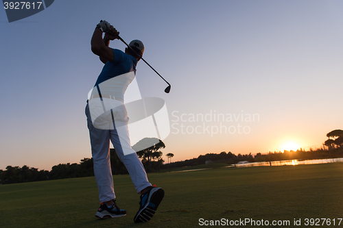 Image of golfer hitting long shot