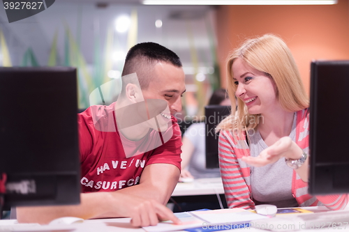 Image of technology students group working  in computer lab school  class