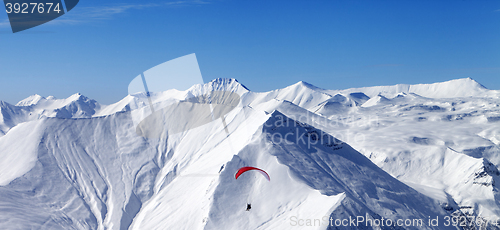 Image of Panoramic view on sky gliding in high mountains
