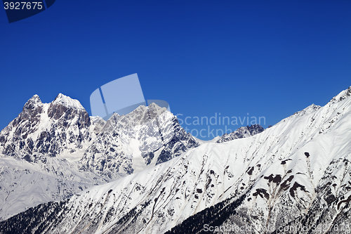 Image of Mounts Ushba and Chatyn and blue clear sky