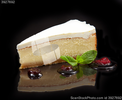 Image of cheese cake on black background