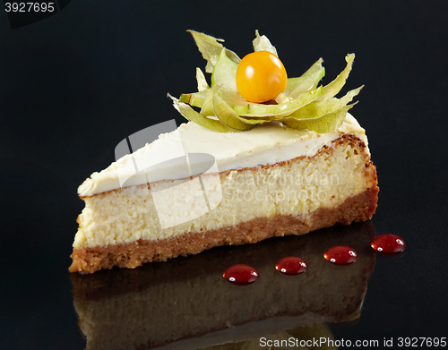 Image of cheese cake on black background