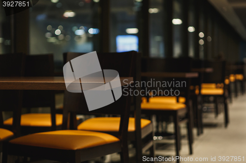 Image of rows of tables and chairs in the cafe