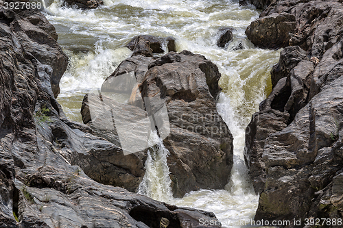 Image of Waterfall Flowing Between the Lava Stones