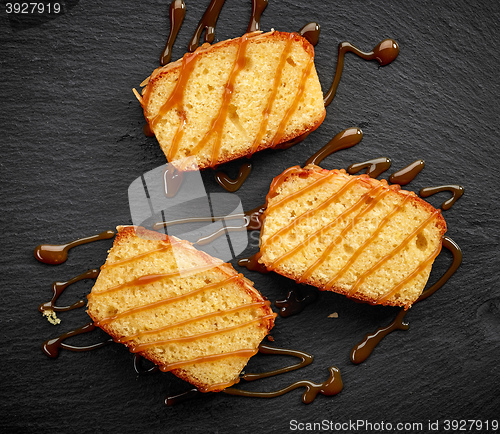Image of biscuit cake slices with sweet caramel sauce