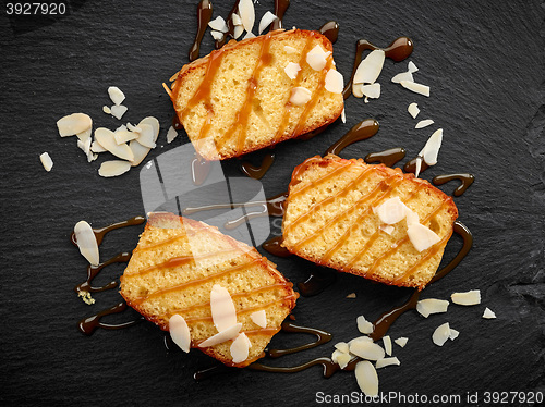 Image of biscuit cake slices with sweet caramel sauce