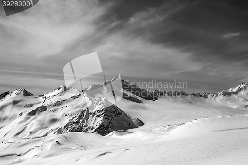 Image of Black and white view on off-piste slope at sun evening
