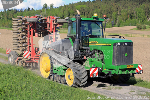 Image of John Deere 9520T Agricultural Crawler Tractor and Cultivator