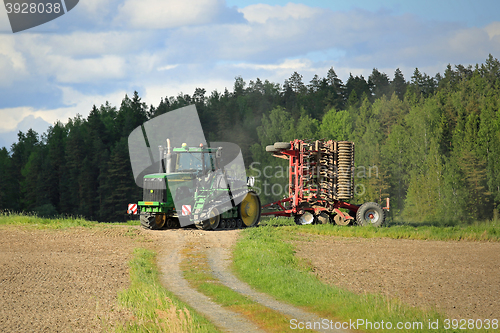 Image of Landscape with John Deere 9520T Crawler Tractor