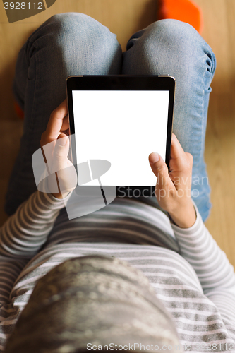 Image of woman working on tablet