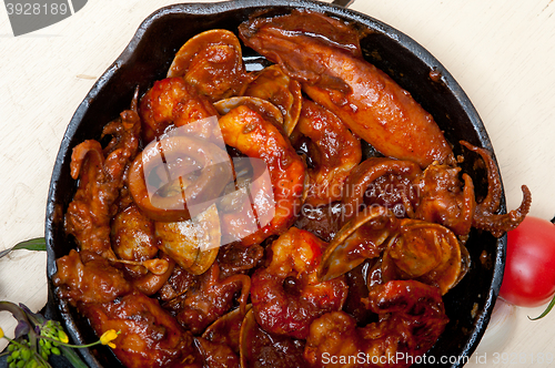 Image of fresh seafoos stew on an iron skillet