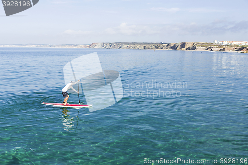 Image of Senior man practicing paddle