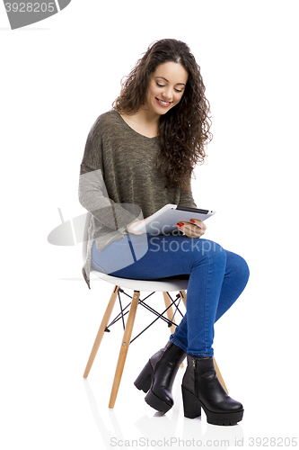 Image of Woman working with a tablet