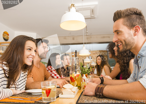 Image of Friends lunching at the restaurant