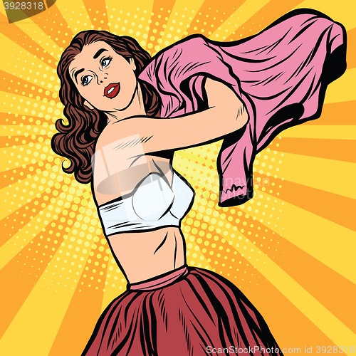 Image of Beautiful retro girl in bra getting dressed