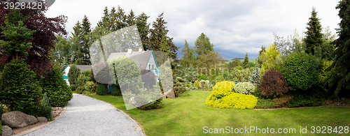 Image of Beautiful house in spring garden