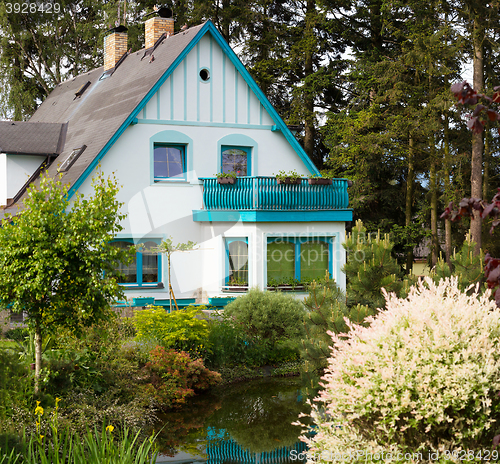 Image of Beautiful house in spring garden