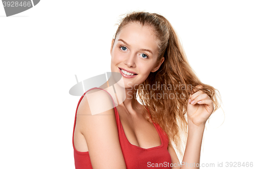 Image of Beauty portrait of young woman touching her face skin