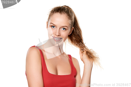 Image of Beauty portrait of young woman touching her face skin