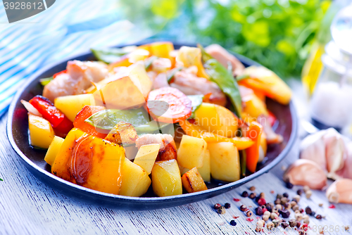 Image of fried meat with vegetables